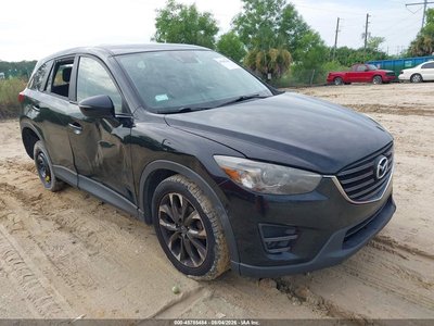 JM3KE4DY7G0****** 2016 Mazda CX-5