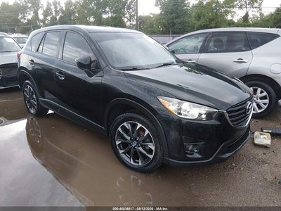 JM3KE4DY5G0****** 2016 Mazda CX-5