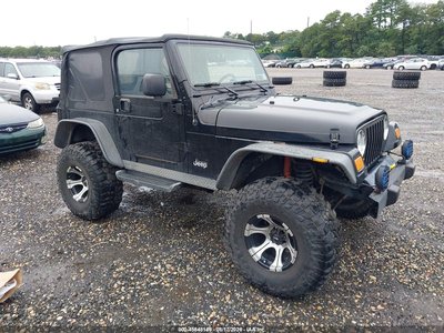 IJ4FA49S64P****** 2004 Jeep Wrangler