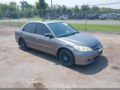 2HGES26744H****** 2004 Honda Civic