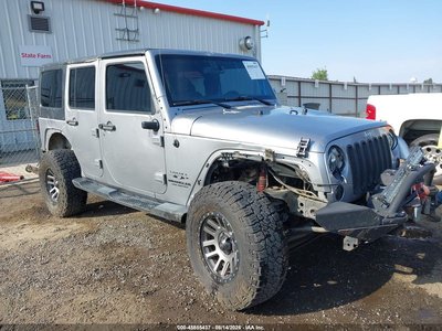 1C4BJWEG0EL****** 2014 Jeep Wrangler