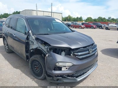 5FNYF6H01GB****** 2016 Honda Pilot