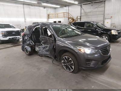 JM3KE4DY9G0****** 2016 Mazda CX-5