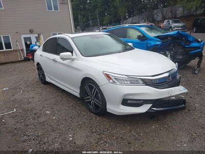 1HGCR3F97GA****** 2016 Honda Accord