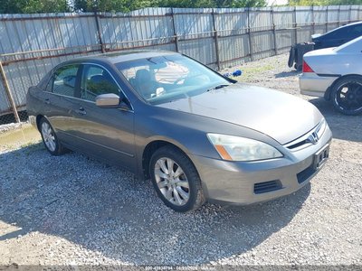 1HGCM66516A****** 2006 Honda Accord