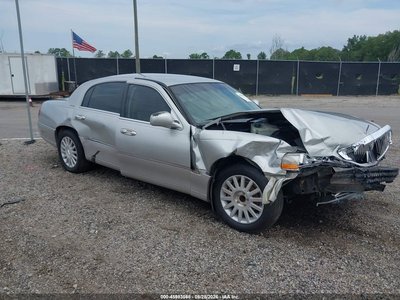 1LNHM81W34Y****** 2004 Lincoln Town Car