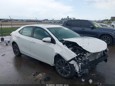 5YFBURHE7EP****** 2014 Toyota Corolla