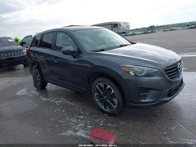 JM3KE4DY7G0****** 2016 Mazda CX-5