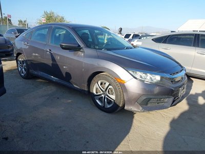 2HGFC2F52JH****** 2018 Honda Civic