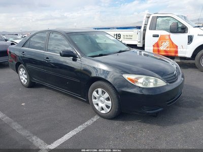 JTDBE32K940****** 2004 Toyota Camry