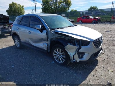 JM3KE4CY7G0****** 2016 Mazda CX-5