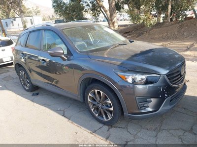 JM3KE4DY3G0****** 2016 Mazda CX-5