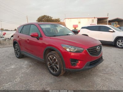 JM3KE4DY7G0****** 2016 Mazda CX-5