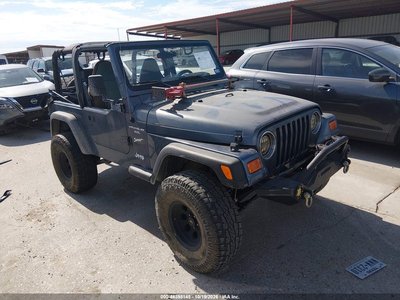 1J4FA49S42P****** 2002 Jeep Wrangler